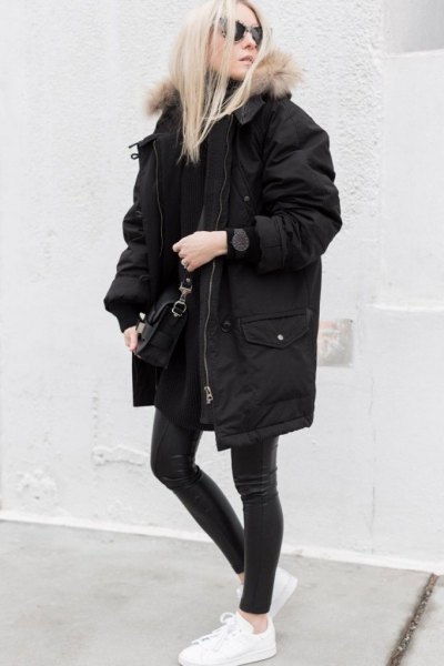 black oversized parka jacket with matching skinny jeans