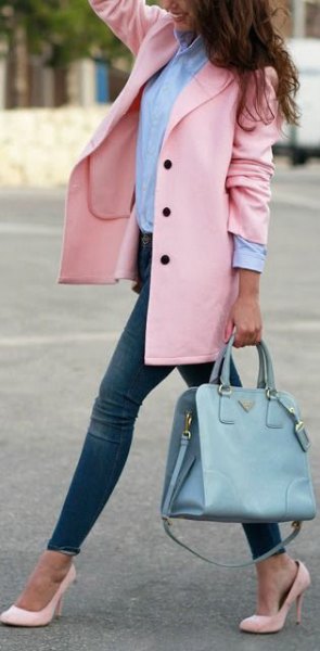 Blushing wool coat with a blue shirt with buttons and light pink pointed toe heels