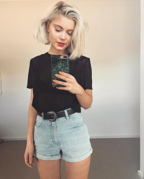 black t-shirt with light blue jeans shorts with mini cuff