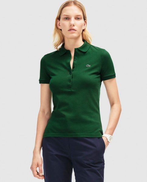 Dark green slim fit polo shirt with black chinos with a relaxed fit