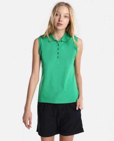 Light green sleeveless polo shirt with black, flowing shorts