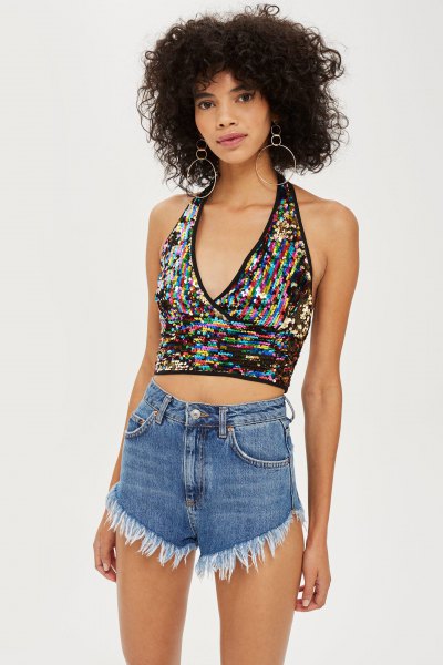 silver and black patterned metallic halter top with blue denim shorts