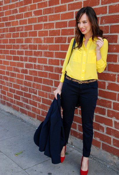 bright yellow shirt with buttons and chinos and red heels