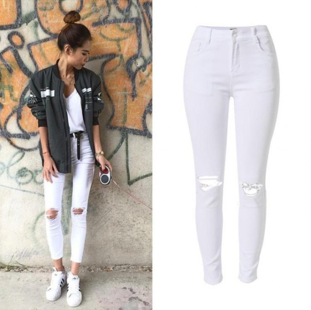 gray bomber jacket with short white skinny jeans with a high waist