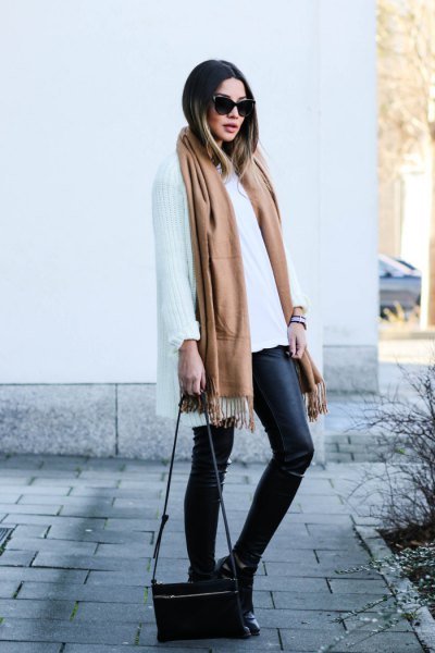 Long camel scarf with white oversized scarf and leather leggings
