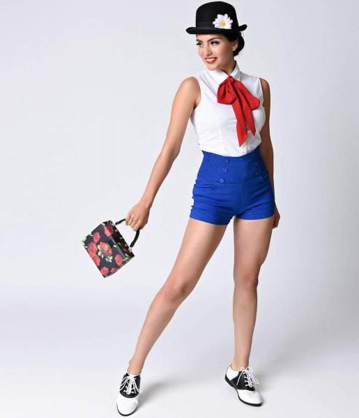 white sleeveless shirt with red bow tie and royal blue stretch shorts