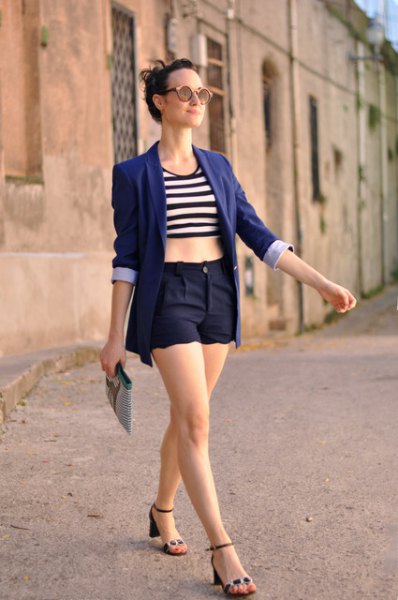 black and white striped crop top with dark blue blazer and matching shorts with scalloped hem