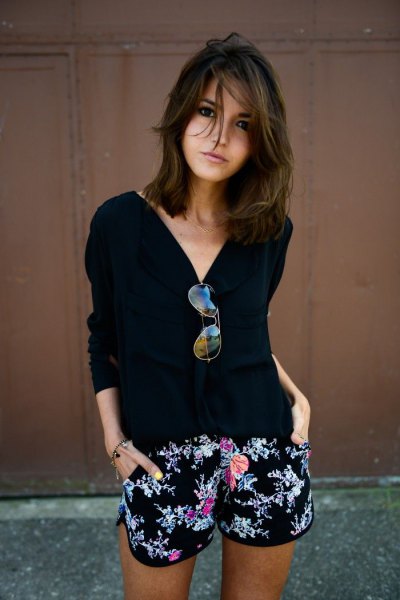 black sweater with v-neck and tribal-printed mini cotton shorts