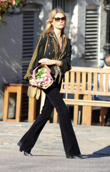 black blazer with leopard print scarf and flared jeans