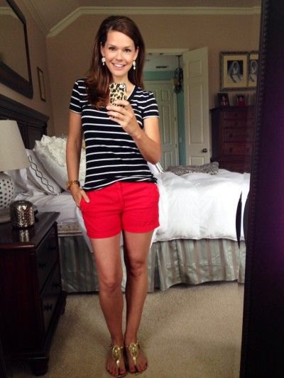 black and white striped t-shirt with mini shorts and silver sandals