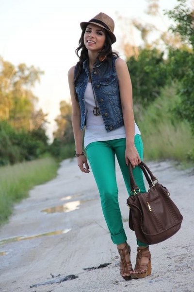 blue denim mini vest with white tank top and gray slim fit trousers with cuffs