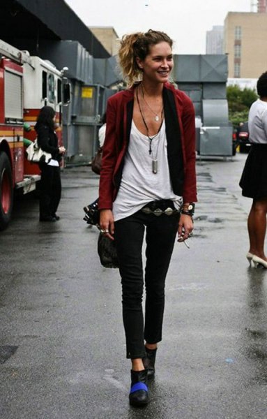 Burgundy blazer with white tank top with a scoop neckline and black, slim-cut ankle jeans