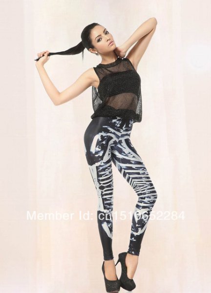 sleeveless chiffon top with graphic black and white leggings
