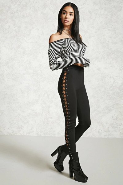 Black and white shoulder t-shirt with laced up leggings