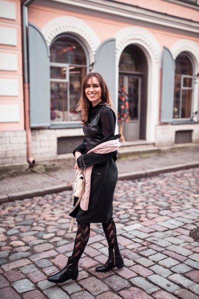 black leather dress with ankle boots and striped tights