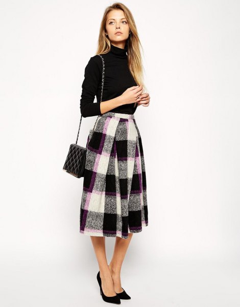 Mock neck sweater with black and white flared midi wool skirt