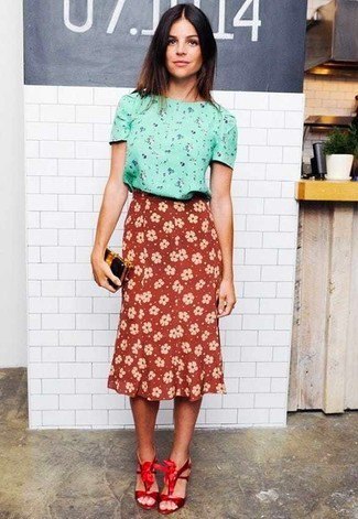 Pink blouse with floral pattern and high waisted red midi skirt