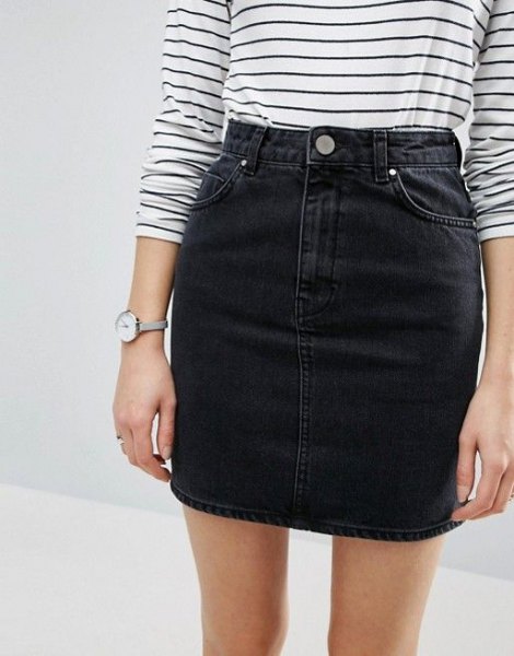 striped long-sleeved T-shirt with black, high-waisted denim mini skirt
