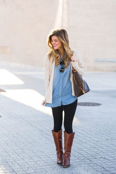 Light pink cardigan with a tunic denim shirt and gray leather boots