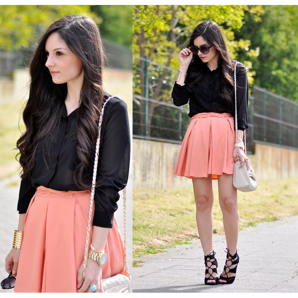 black shirt with buttons and light orange mini-skirt