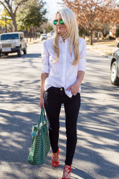 white silk shirt with buttons and black slim fit jeans