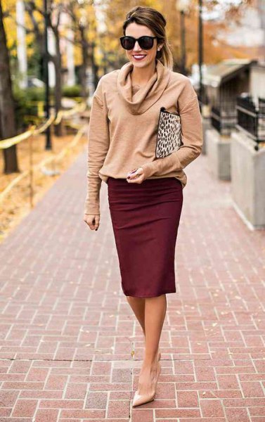 Blush pink cowl neck sweater with auburn pencil skirt