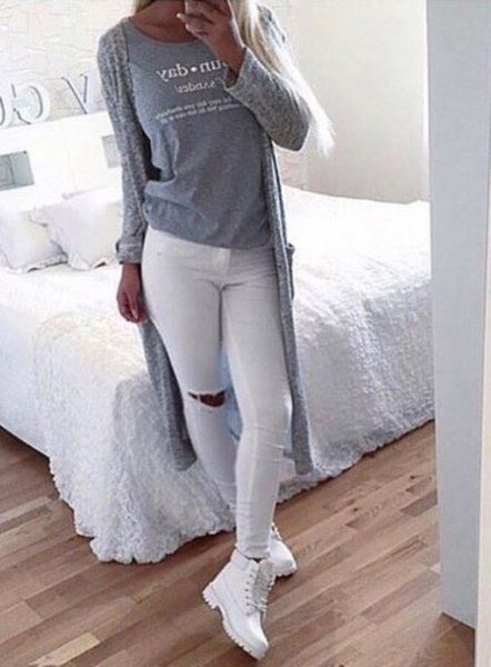 gray cardigan made of knitted sweater with white skinny jeans and boots