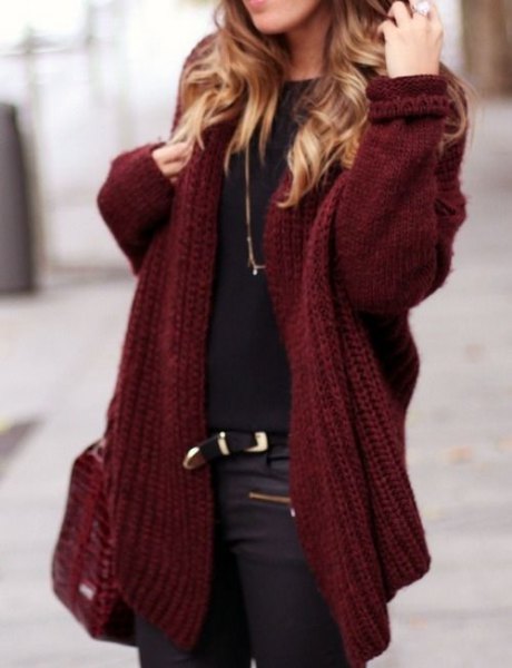 chunky maroon cardigan with black t-shirt and leather moto pants