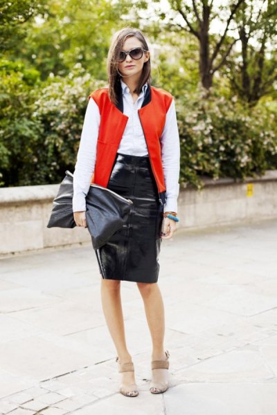 light red college sleeved jacket with white button up shirt and black leather skirt