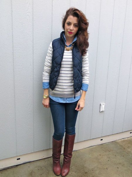 gray and white striped sweater over light blue chambray shirt
