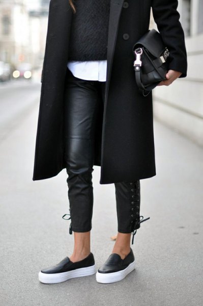 black long-line wool coat with leather legs