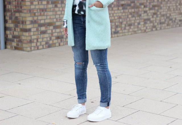 white fleece longline blazer with slim fit cuffed jeans and platform shoes