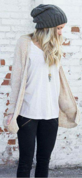 ivory knitted long cardigan with black skinny jeans