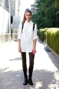 white oversized button up shirt with black skinny jeans and leather ankle boots