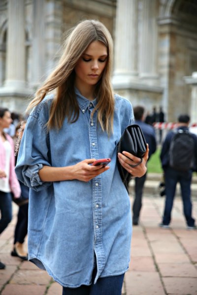 oversized light blue chambray button up shirt with black leggings