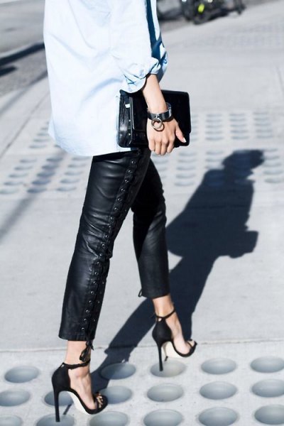 light blue button up shirt with cropped leather pants and heels