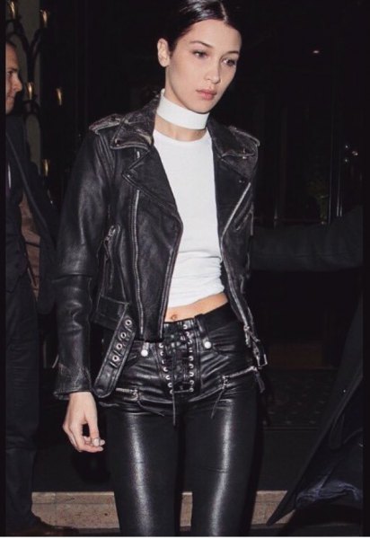 black leather jacket with cropped tee and cycling pants