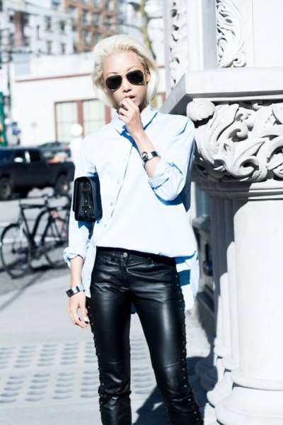 light blue button up shirt with black lace leather pants