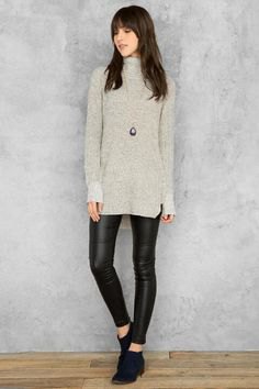 gray tonic sweater with suede with black leather clothes