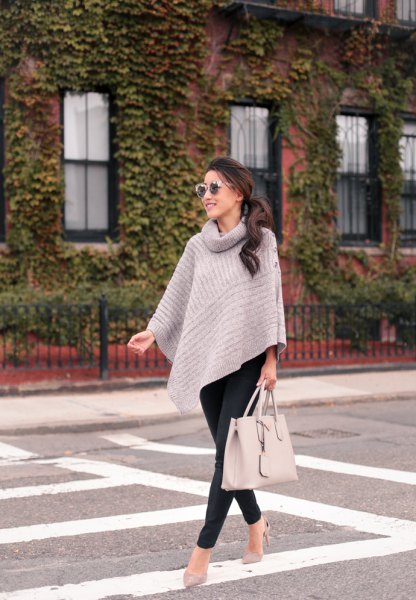 turtleneck gray cape sweater with black slim fit pants