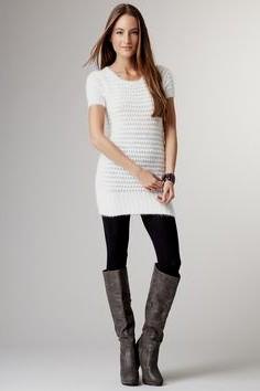 white form fitting short sleeve sweater dress with leggings