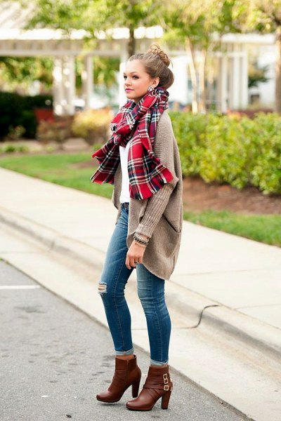 gray ribbed cardigan with red checkered scarf and high heeled ankle boots