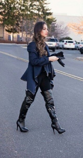 navy sweater jacket with black leather over knee high boots