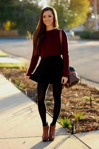 black fitted sweater with skater mini skirt and brown leather boots