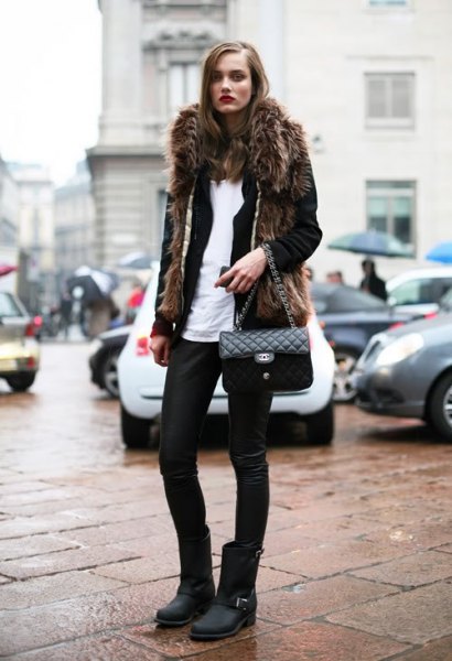 black fur coat with leather pants and matte moto boots