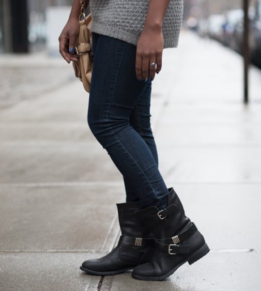light gray knit sweater with dark skinny jeans and black leather boots
