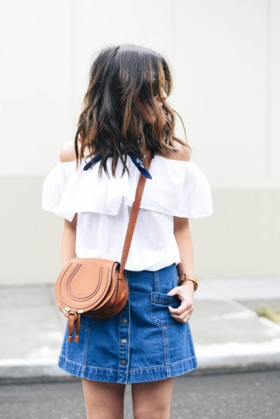 white from the shoulder blouse with blue mini denim skirt