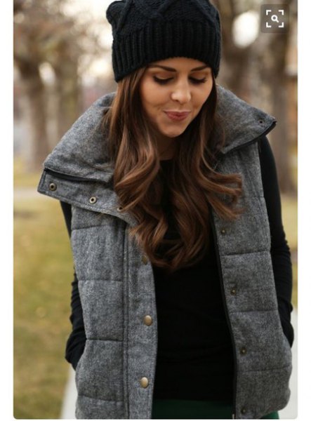 black knitted hat with sweater with thick vest