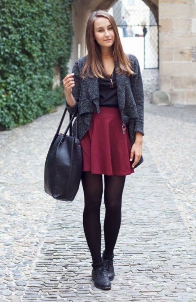 gray short knit blazer with red mini-pleated skirt