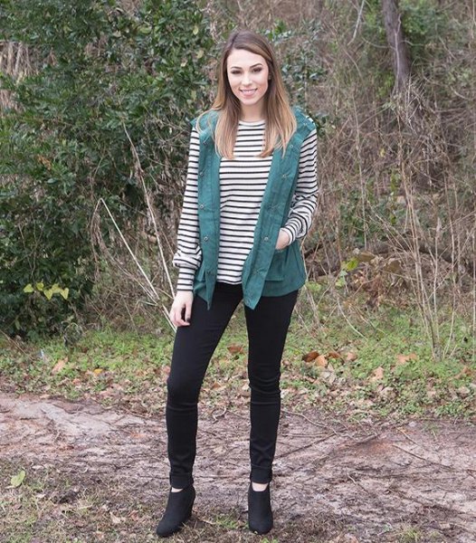 gray military vest with black and white striped long sleeve tee
